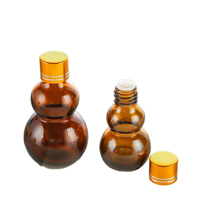 Customizable Premium 10ml/50ml/100ml Amber Glass Perfume Oil Roll On Bottles With Golden Mirror Finish‌ Dual Golden Caps & Thickened Base‌