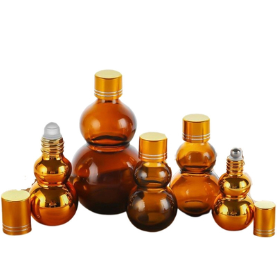 Customizável Premium 10ml / 50ml / 100ml vidro de âmbar perfume óleo rolo em garrafas com espelho dourado acabamento duplo de ouro tampas e base espessada
